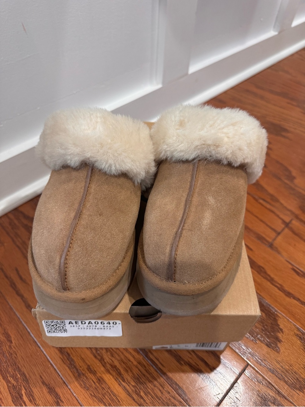 UGG women’s Suede Shearling Lined Slip-On Clog - Chestnut